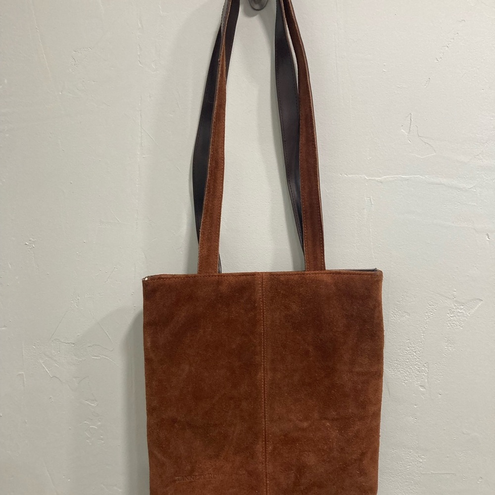 Elegant brown suede tote bag. 10” wife 11” deep 12” handle.